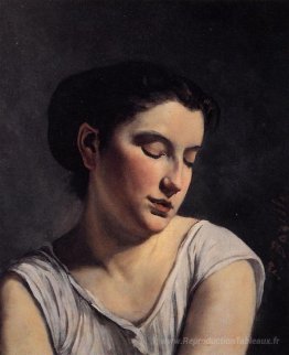 Giovane donna con gli occhi bassi